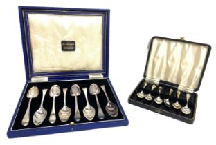 A group of assorted cased silver and silver plated flatware, including two cased sets of twelve