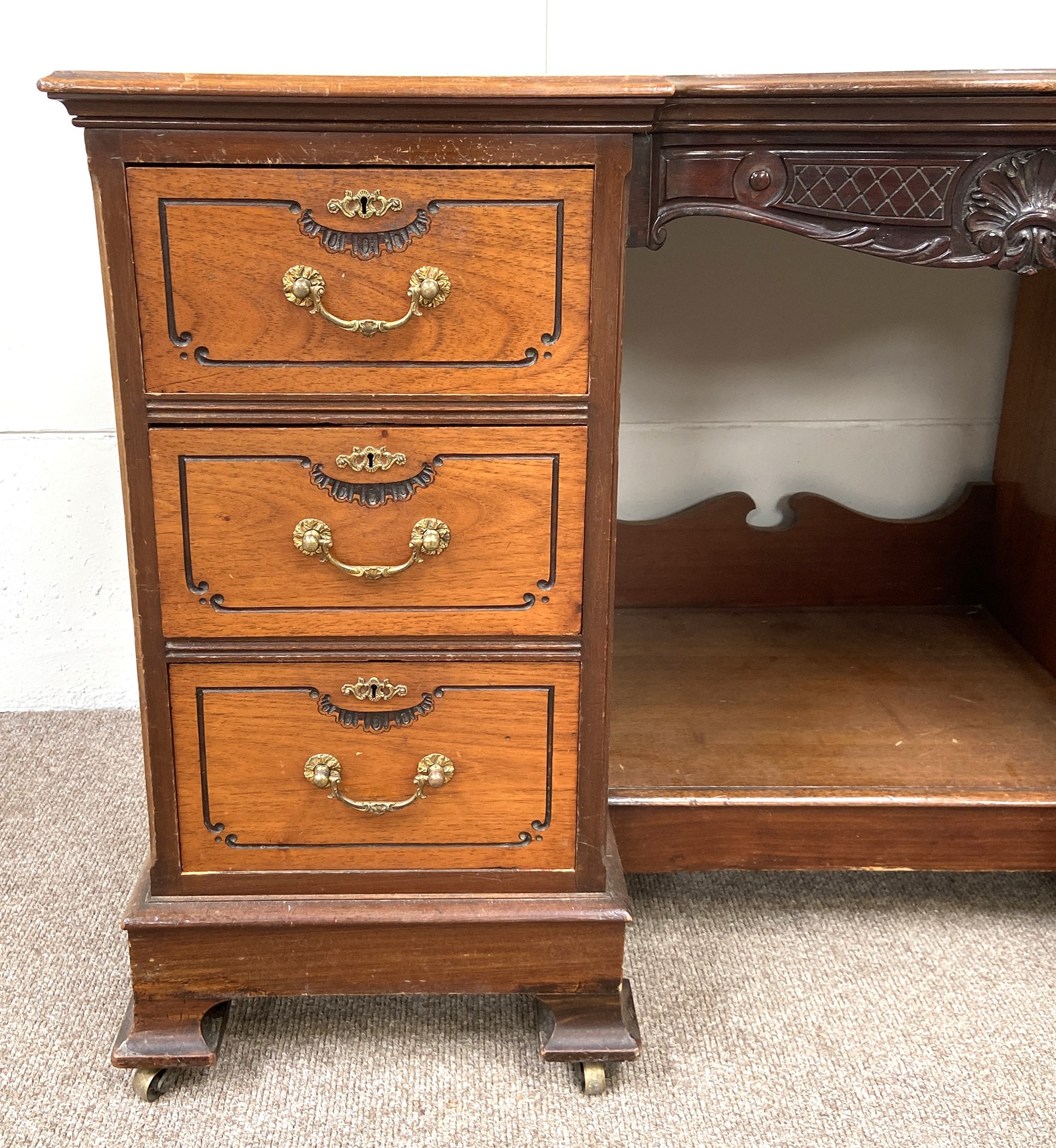 A late Victorian mahogany kneehole desk, with shaped and moulded oblong top over a footwell and - Image 2 of 8