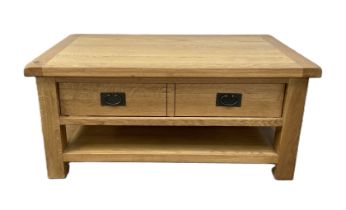 A modern oak coffee table, with rectangular planked top; together with a modern gilt framed wall