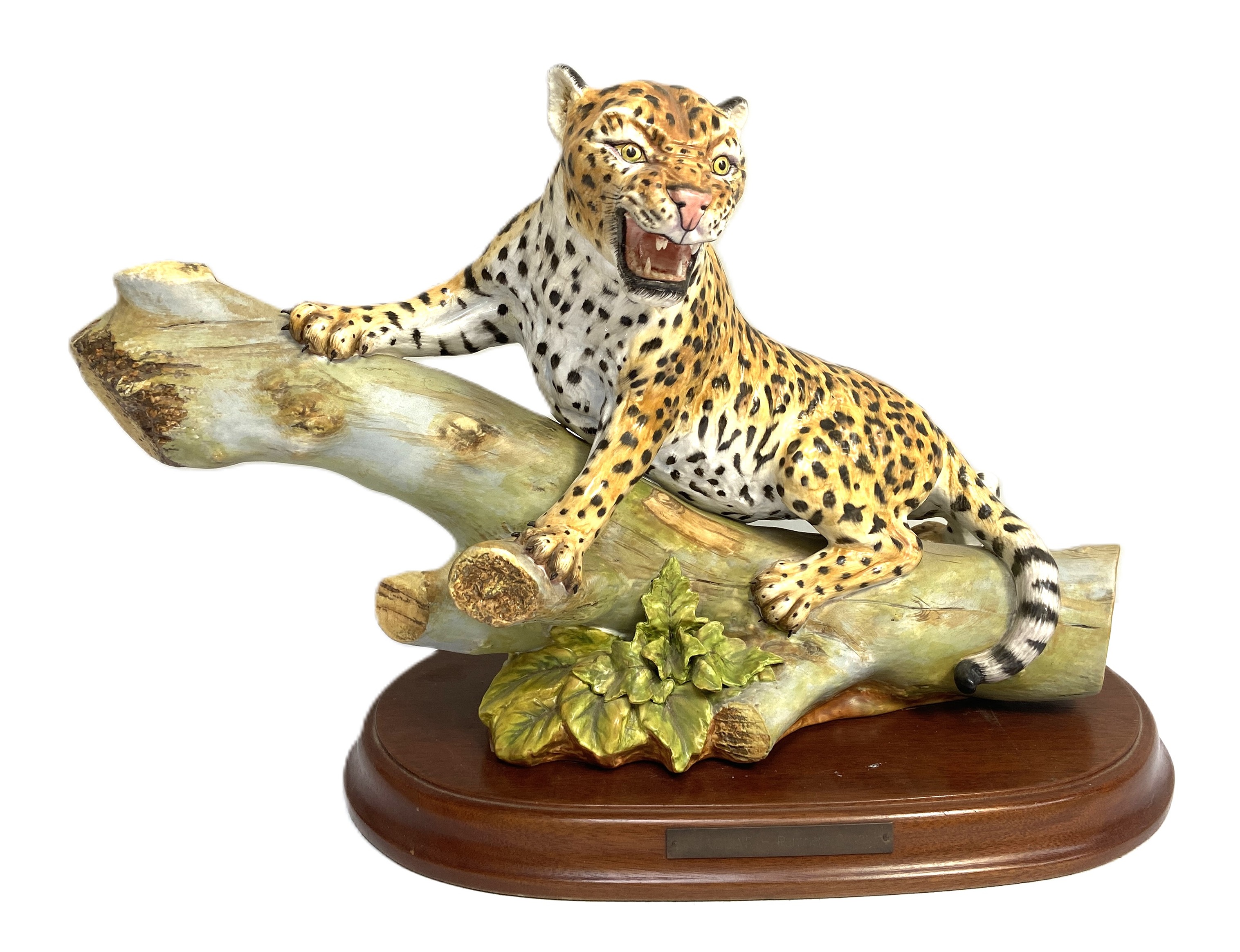 A limited edition Renaissance porcelain figure of a Jaguar, decorated in colours, naturalistically