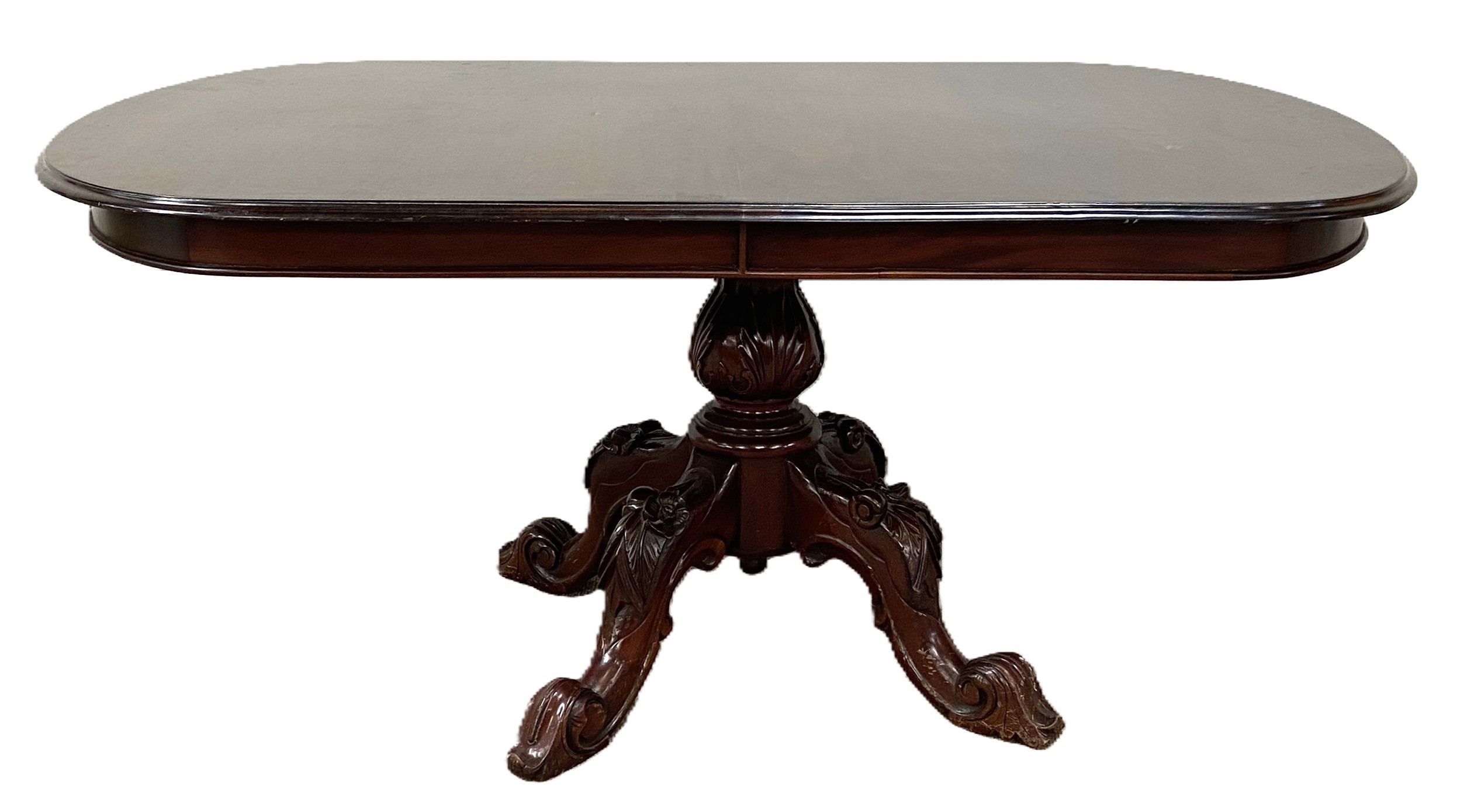 A Victorian style mahogany breakfast table, 20th century, with an oval top on a leaf capped baluster