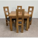 A large and modern oak dining suite, labelled JB Global, including a draw leaf dining table, four