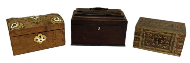 A Victorian walnut tea caddy, with Gothic brass and ivory mounts, fitted with two canisters; also