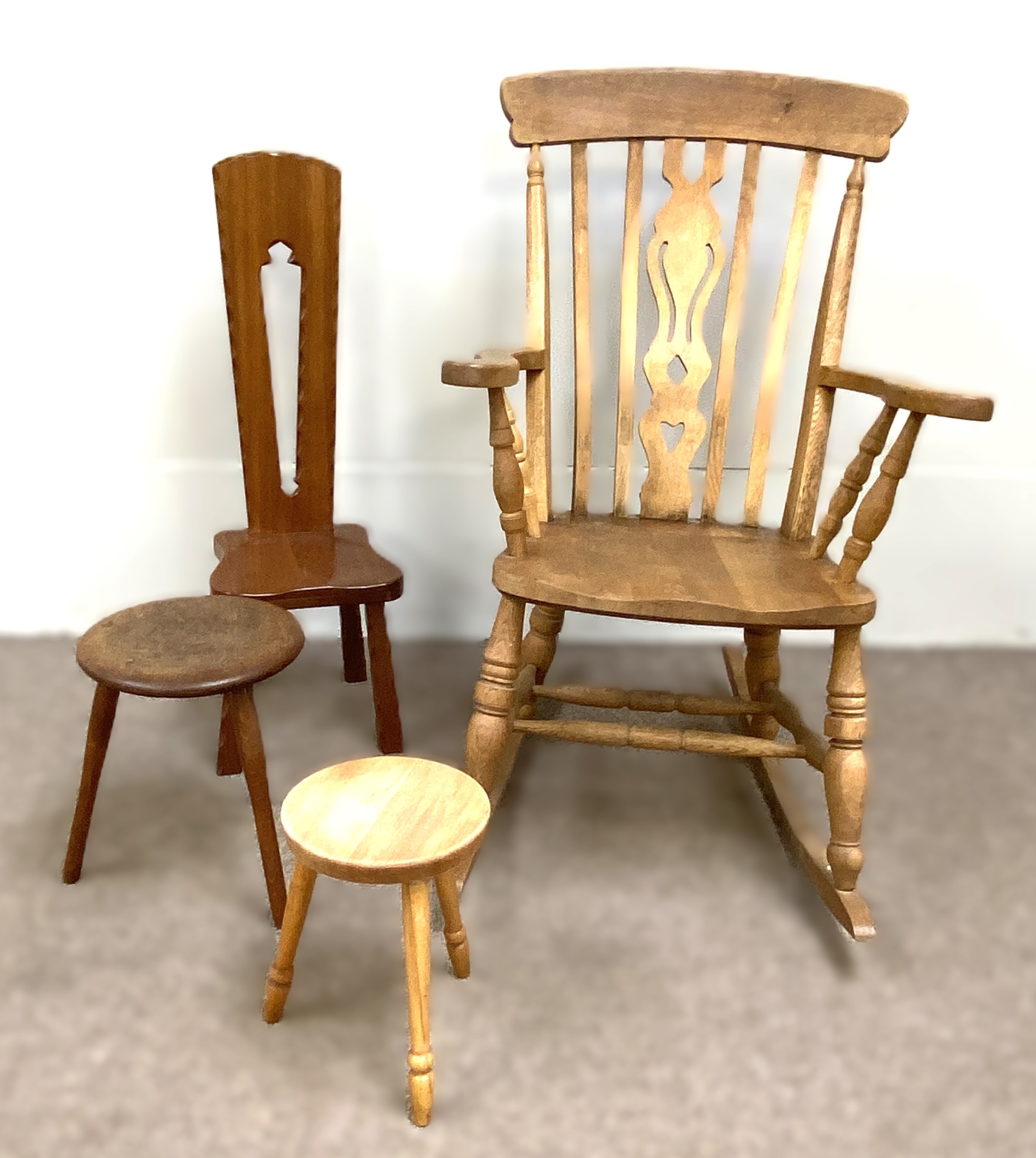 A Victorian style ash framed rocking chair, 110cm high; with a spinning chair and two small