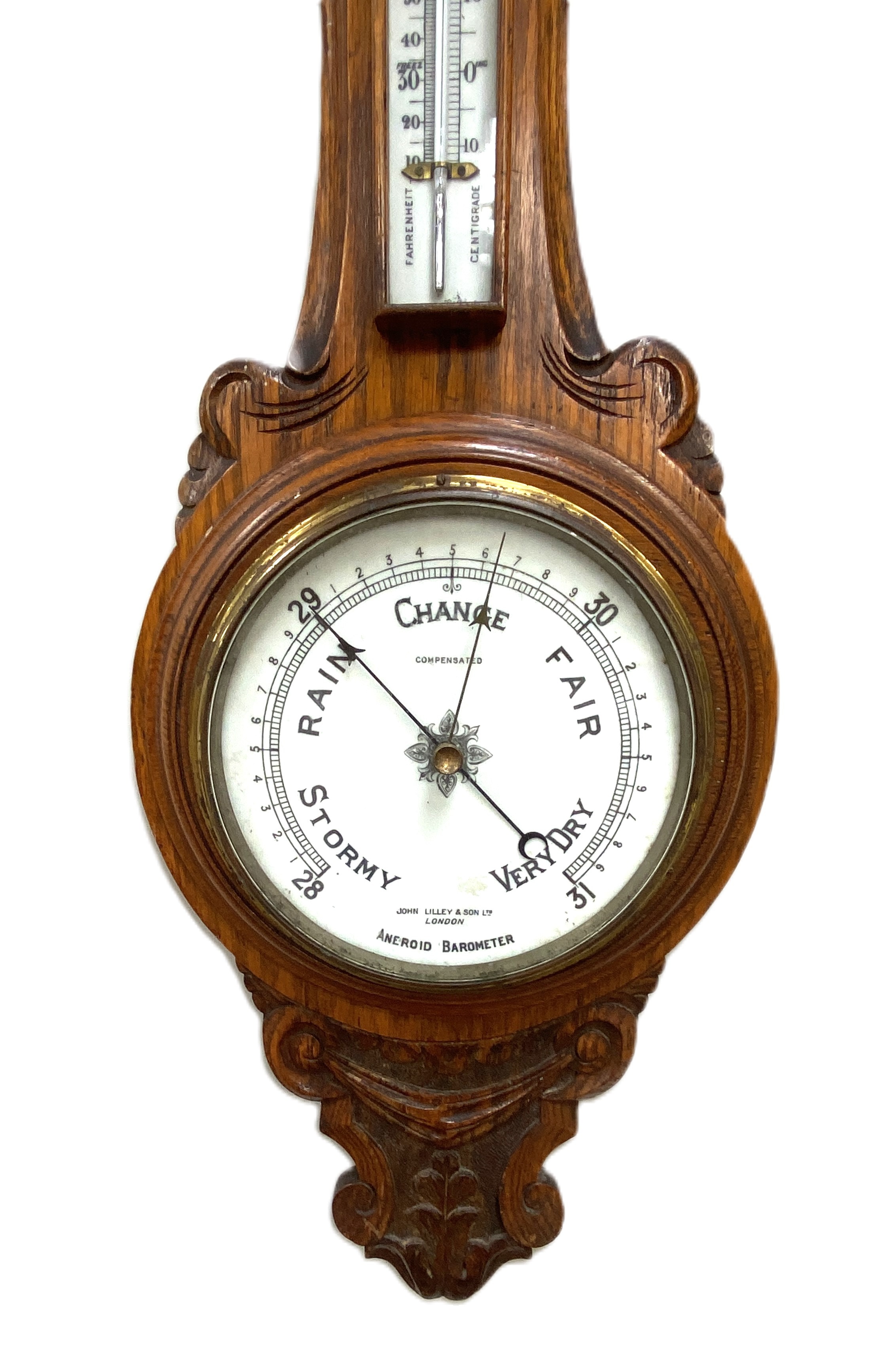 Two Victorian oak cased aneroid wall barometers, late 19th century, both with moulded and carved - Image 4 of 7