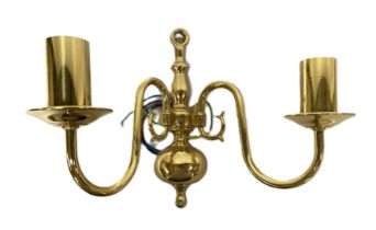 A set of four gilt metal twin light wall fittings, with scroll arms