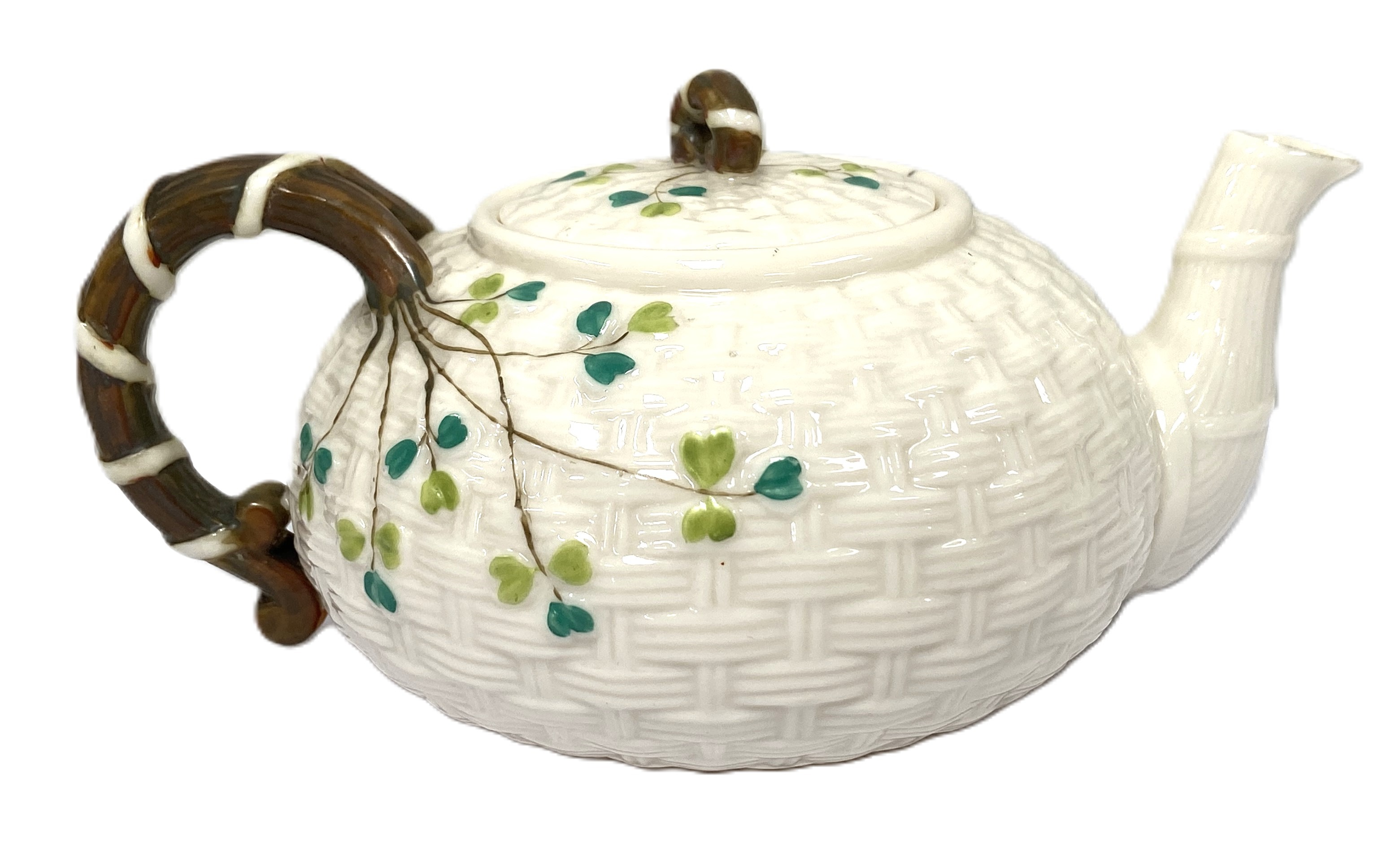 An Irish Belleek part tea service, circa 1900, the teapot with 'basket weave' embossed sides and - Image 6 of 8