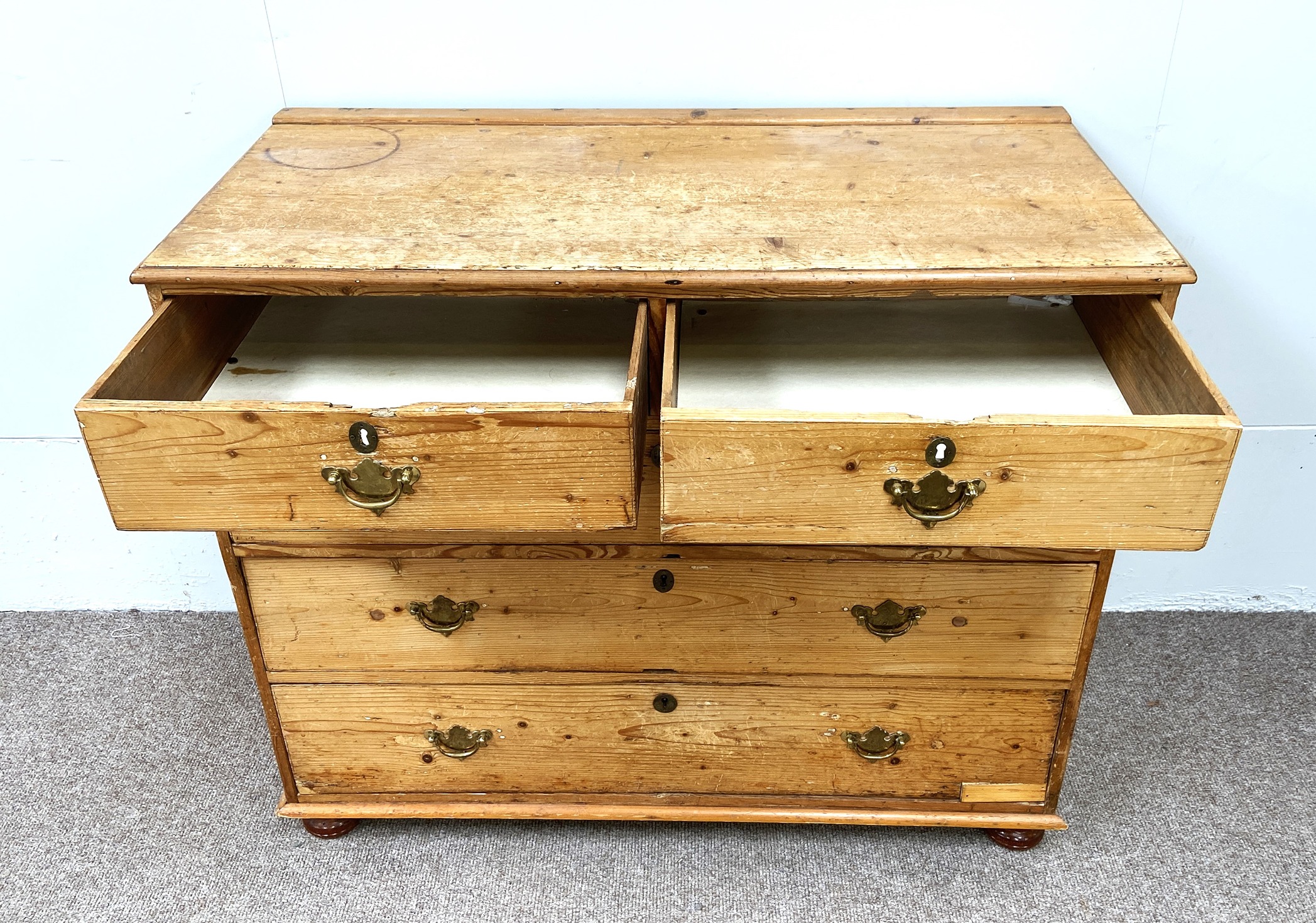 A vintage stripped pine chest of drawers, with two short and three long drawers, 90cm high, 119cm - Image 4 of 4