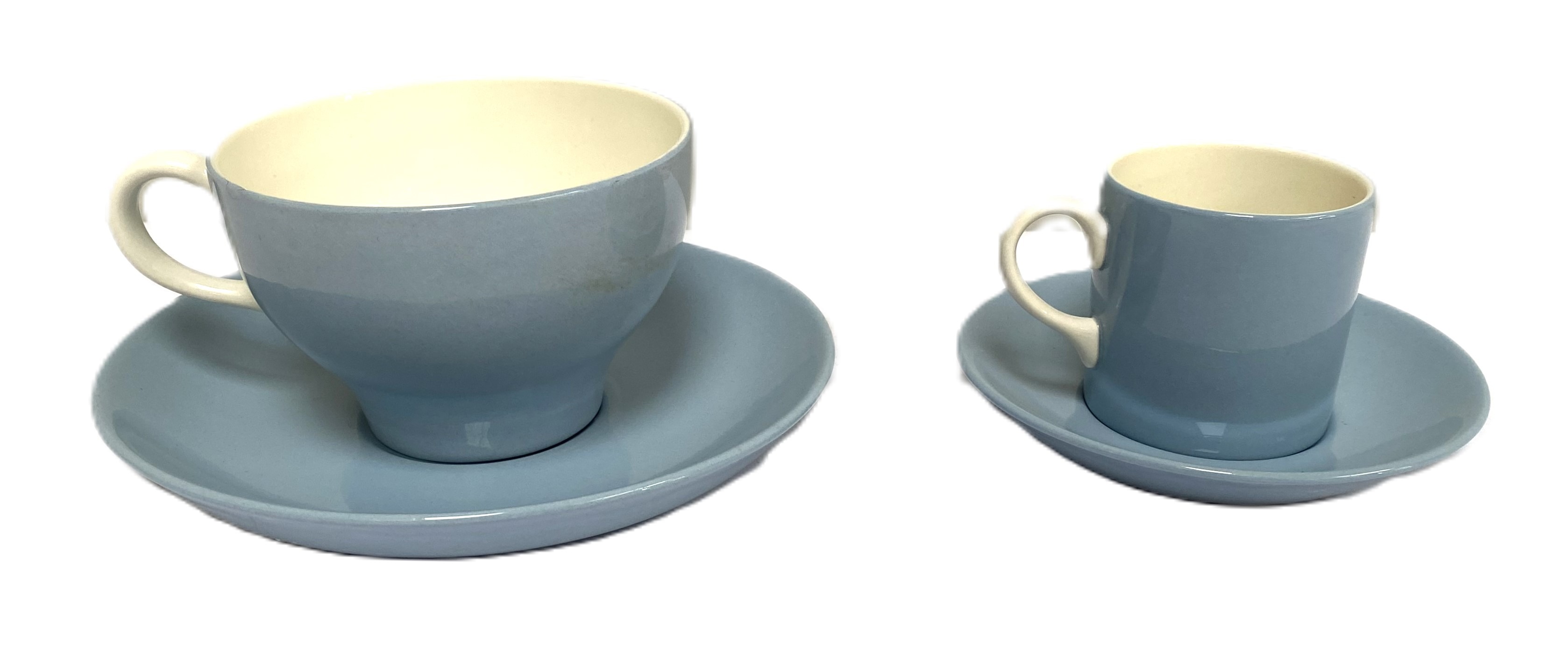 A Wedgwood Etruria ‘Summer Sky’ part dinner service, including coffee cans and a sauceboat; and