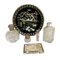Assorted silver topped glass dressing table bottles, also a mother of pearl mounted card case (5)