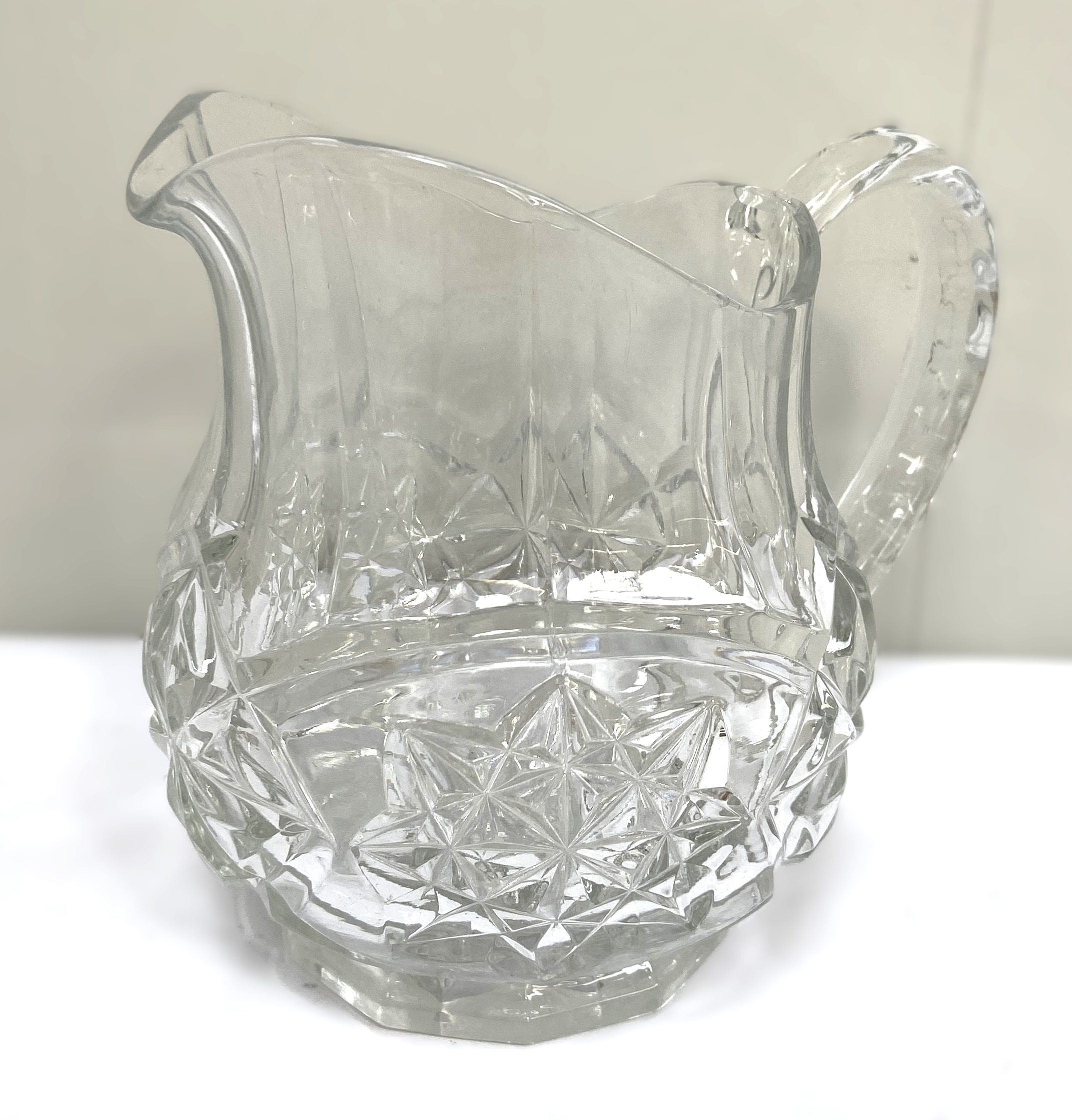 A collection of various cut glass jugs, a small pair of candlesticks, a flared vase and similar - Image 5 of 6