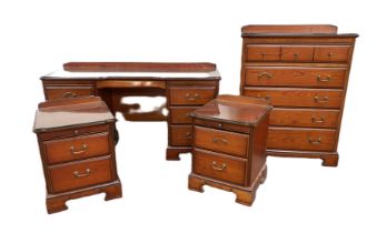 A modern five piece bedroom suite, circa 2000, comprising a dressing table, chest of drawers,