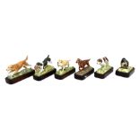 Royal Worcester, a set of six bone china Sporting Dogs, circa 1975, including a Springer Spaniel,
