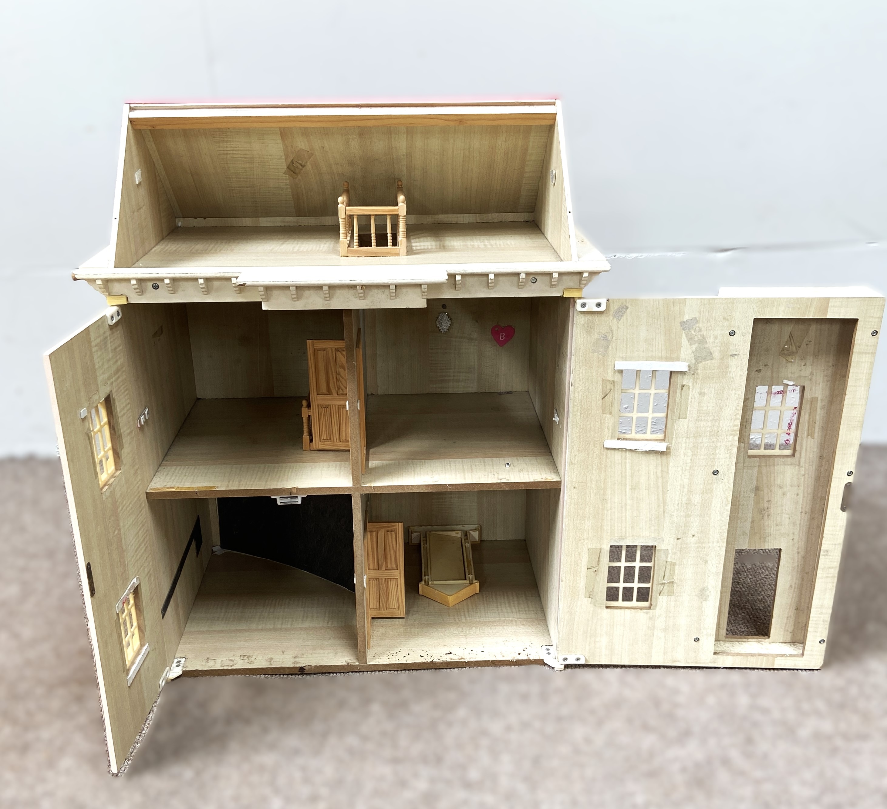 A Queen Anne style child’s Dolls House, with painted hinged front opening to four rooms, 57cm wide - Image 2 of 5