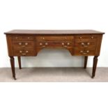 A Georgian style  mahogany combined sideboard, writing table, late 18th century and later