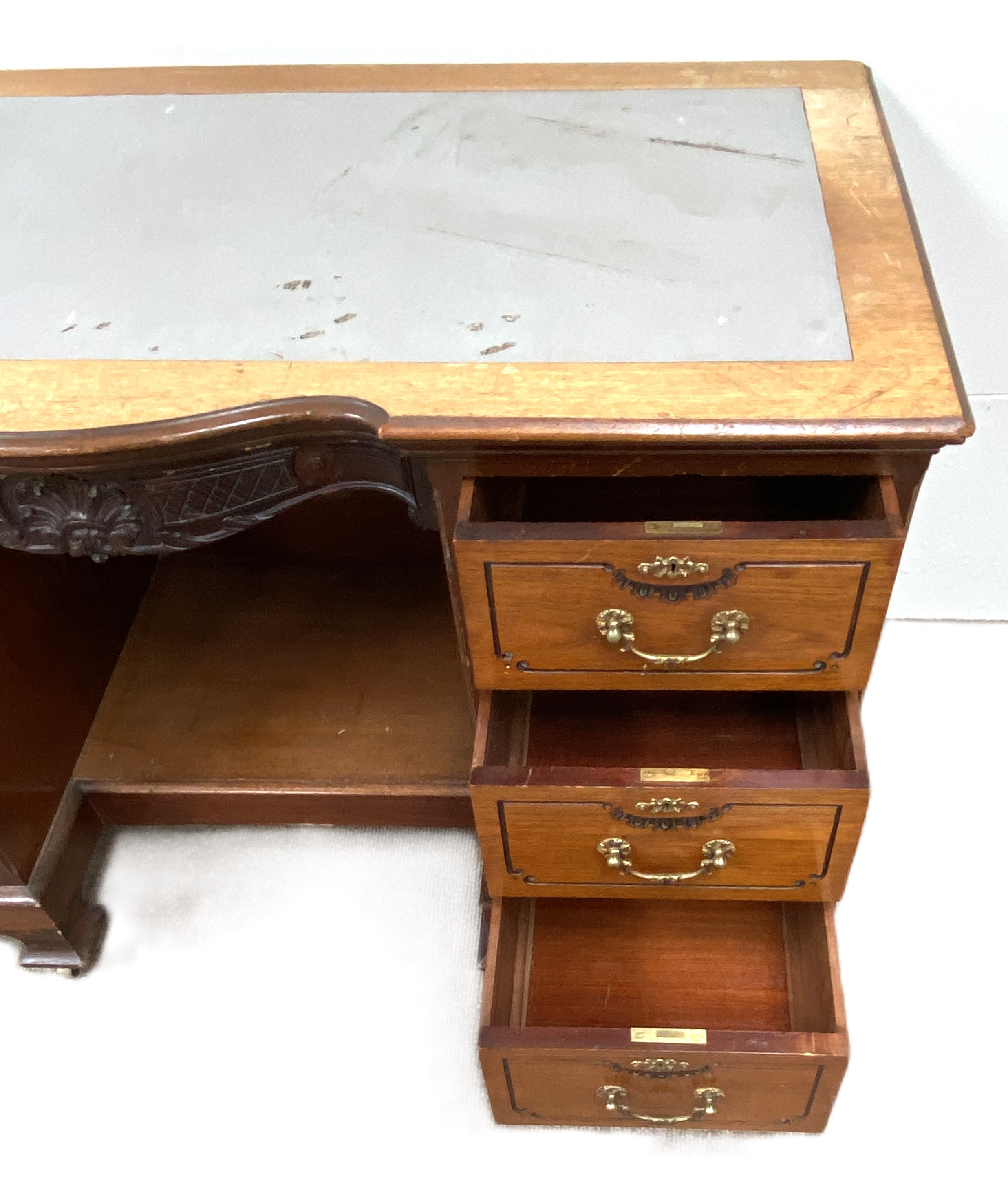 A late Victorian mahogany kneehole desk, with shaped and moulded oblong top over a footwell and - Image 5 of 8