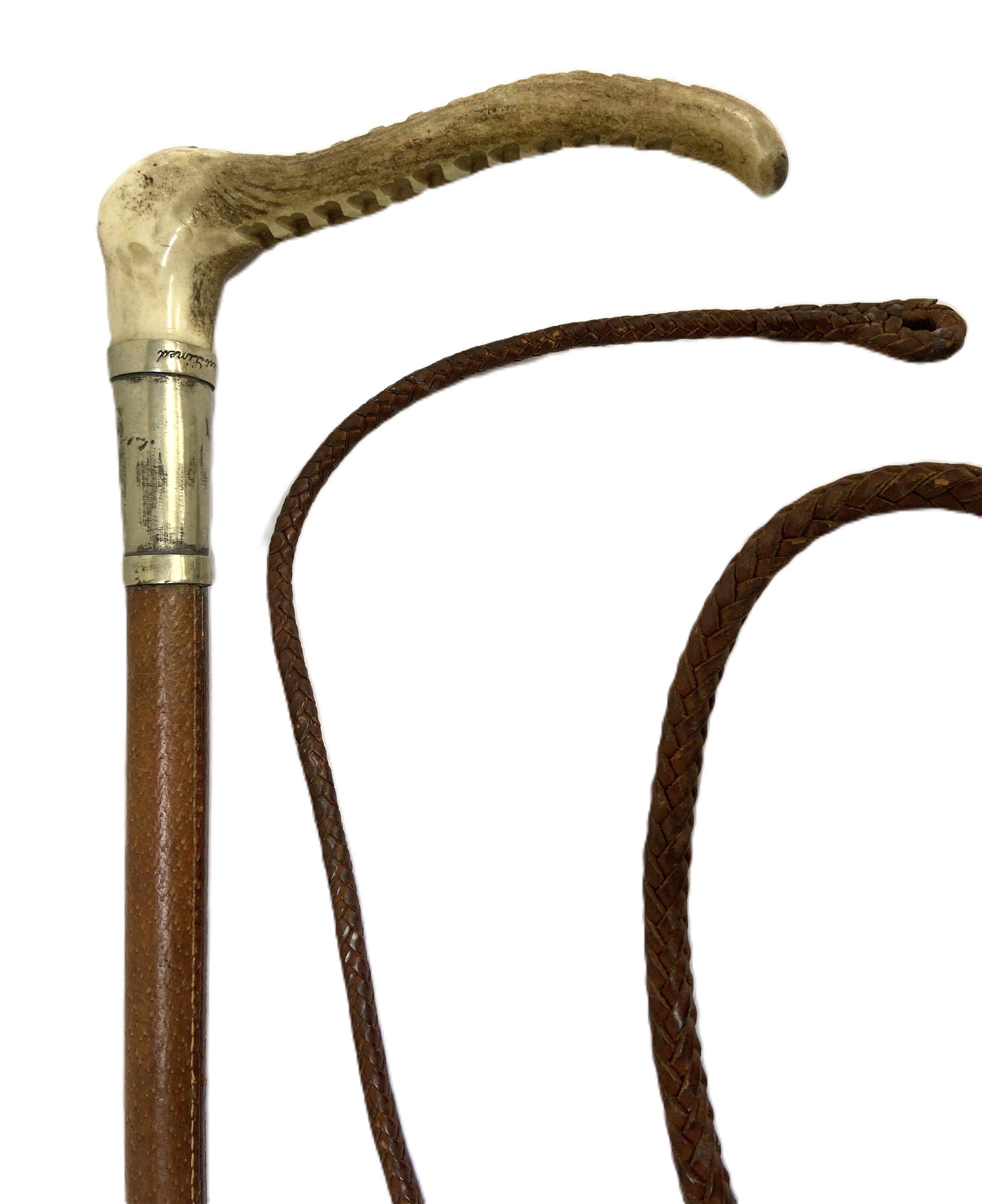 A vintage riding whip, circa 1930, with horn handle and leather shaft and woven whip - Image 2 of 4