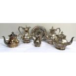 A late Victorian silver plated four piece tea and coffee service; together with a tray and two other