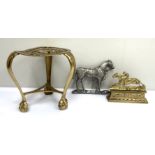 A 19th century brass horse mounting stool, with three legs and cented by a fretwork cut horse;