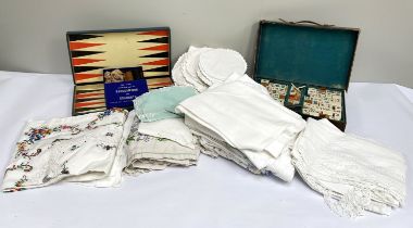 A selection of assorted textiles, including various napery; also a backgammon set etc. (a lot).