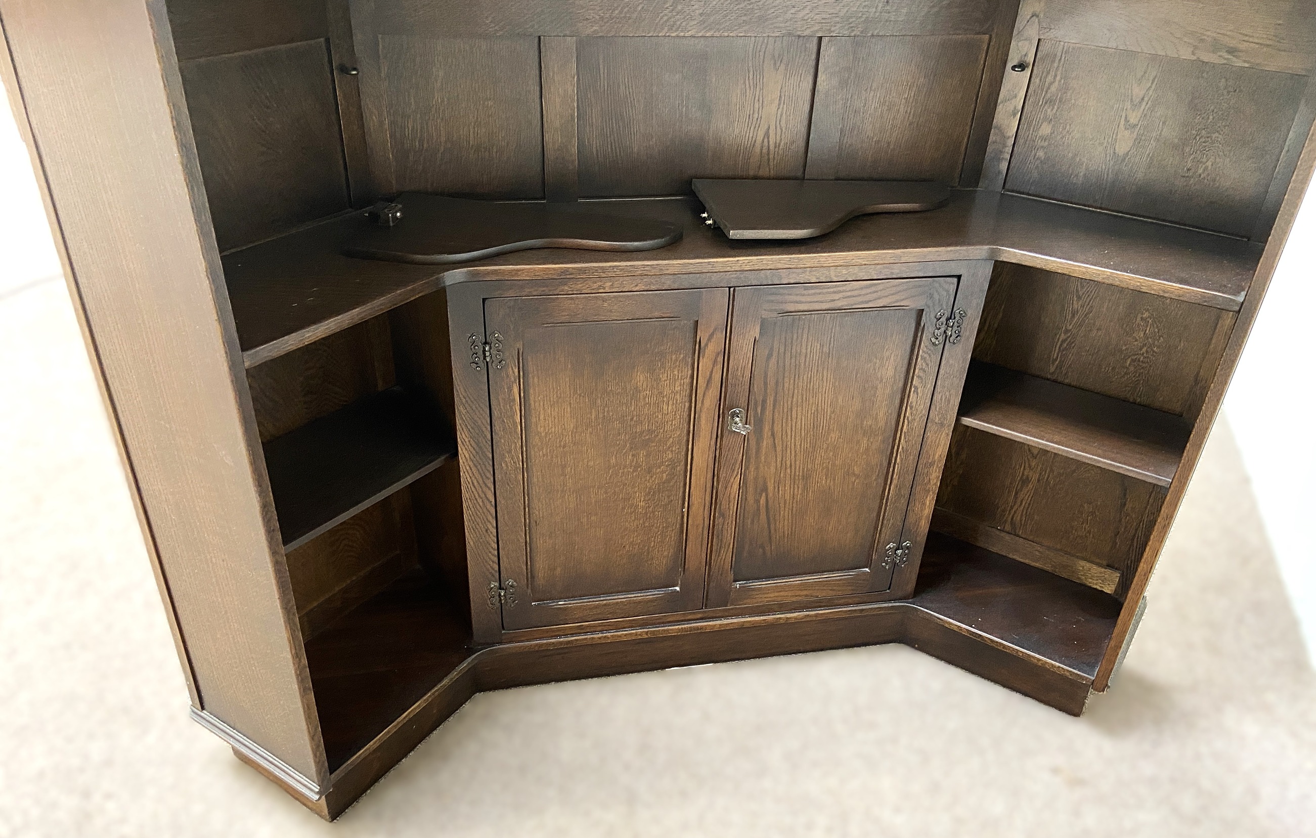 A vintage oak Jacobean style bar, mid 20th century, with canted sides and arched cornice over the - Image 5 of 5