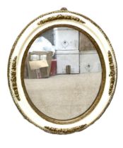 Three assorted mirrors, including a white and gilt painted oval wall mirror; a pine framed