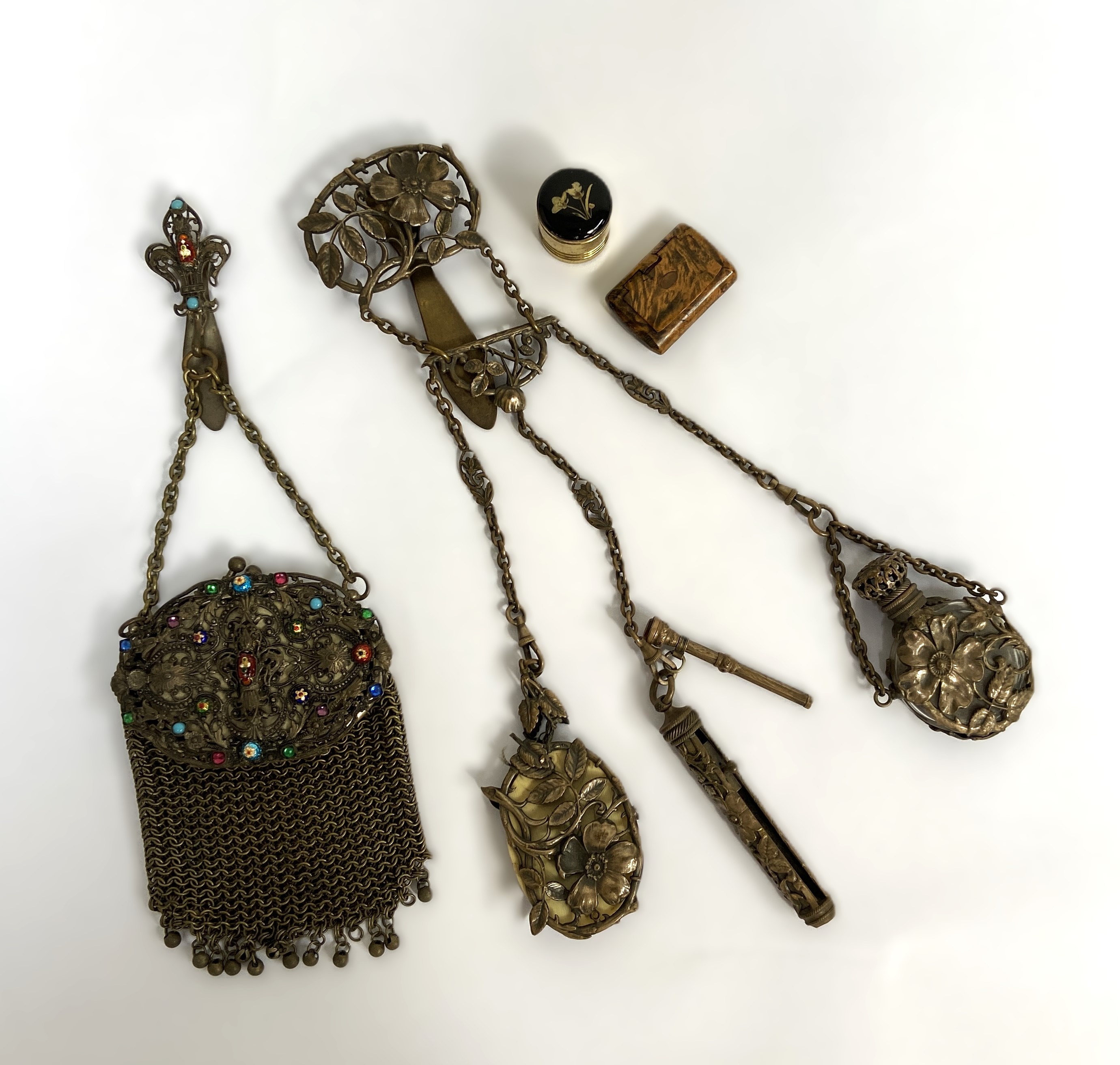 A white metal mesh ladies purse; together with a small novelty wood snuff box, and other
