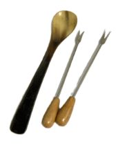 A large assortment of silver plated and related flatware, including a pickle fork, nut crackers