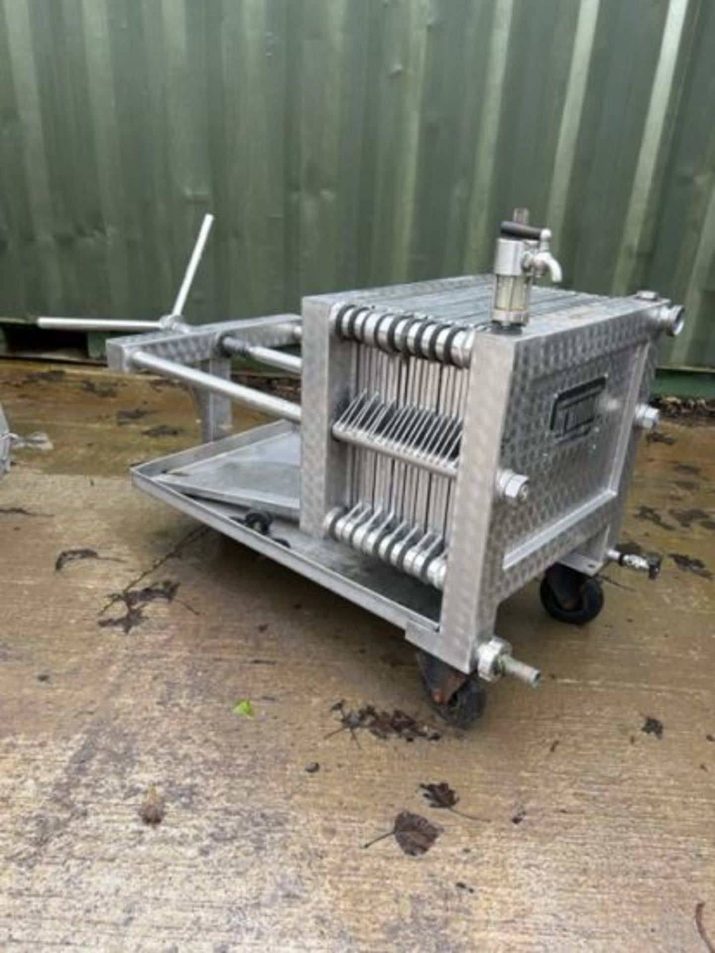 Brüning s/s filter press on trolley, dimensions: 1400 mm x 510 mm x 800 mm.