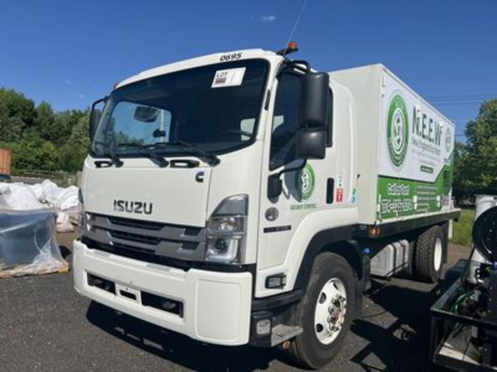 2022 TRASHBIN & DUMPSTER CLEANING TRUCK INCLUDES: 2022 ISUZU FTR 18' FLATBED TRUCK, CUMMINS DIESEL