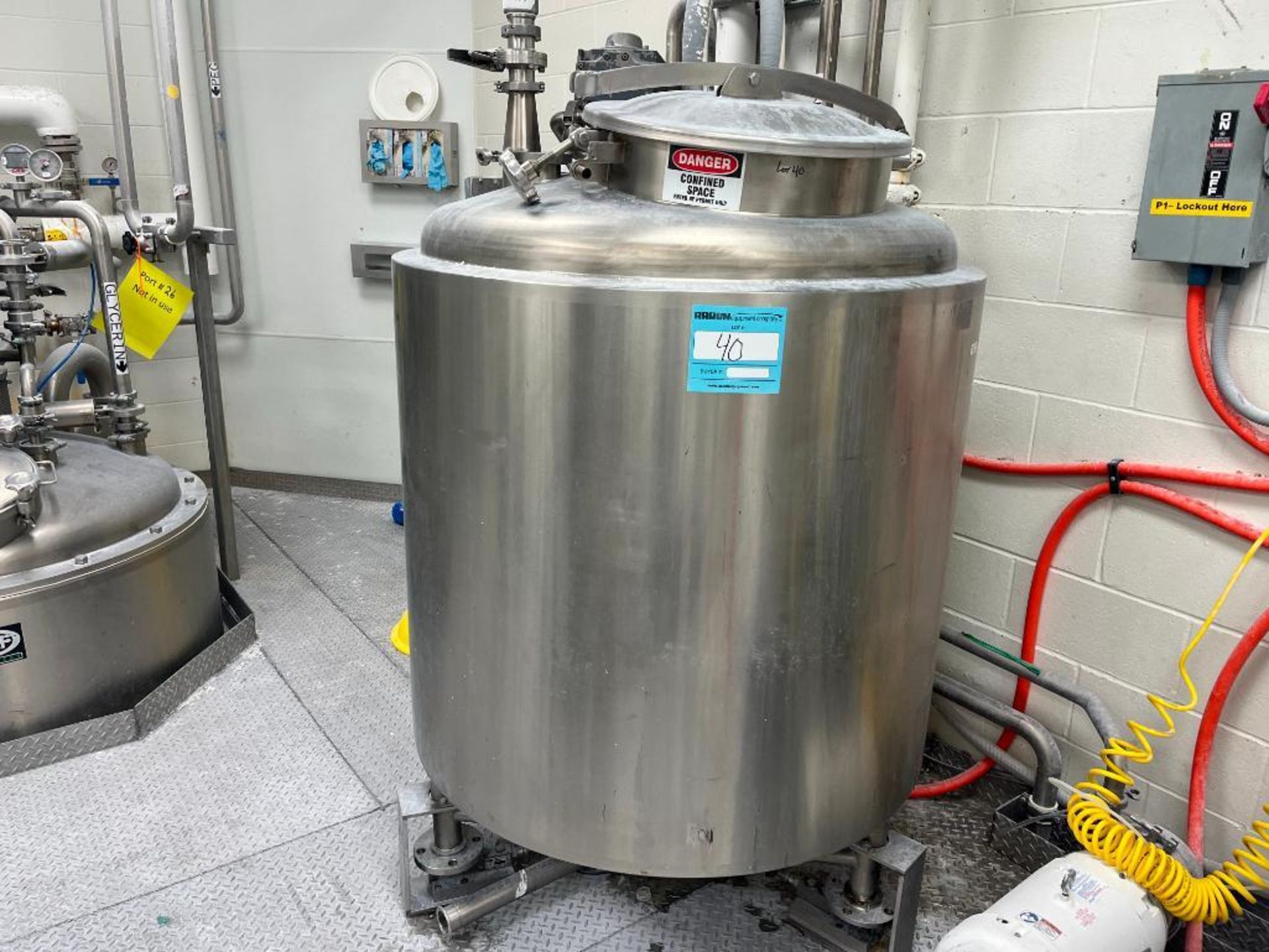 Stainless Steel Tank Aproximate 200 Gallon with Dish Top Cone Bottom. Includes Top Agitator and Cont