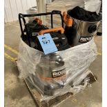 Lot Of (2) Ridgid Vacuums. With spare container, miscellaneous hose and attachments.