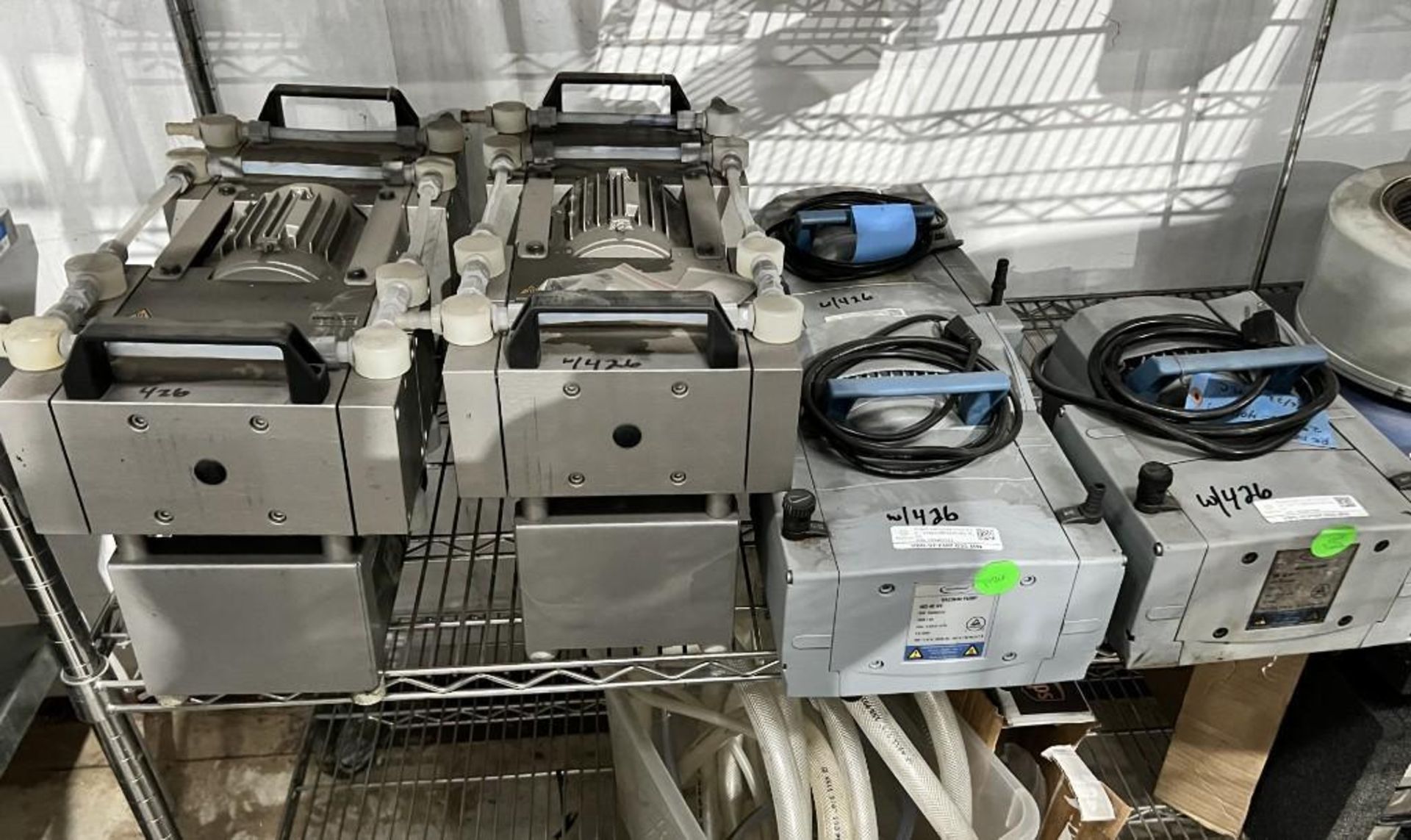 Lot Of (5) Vacuum Pumps. With (3) Vacuubrand model MD-4C-NT, Serial# 103261009, 103462312, 103346605