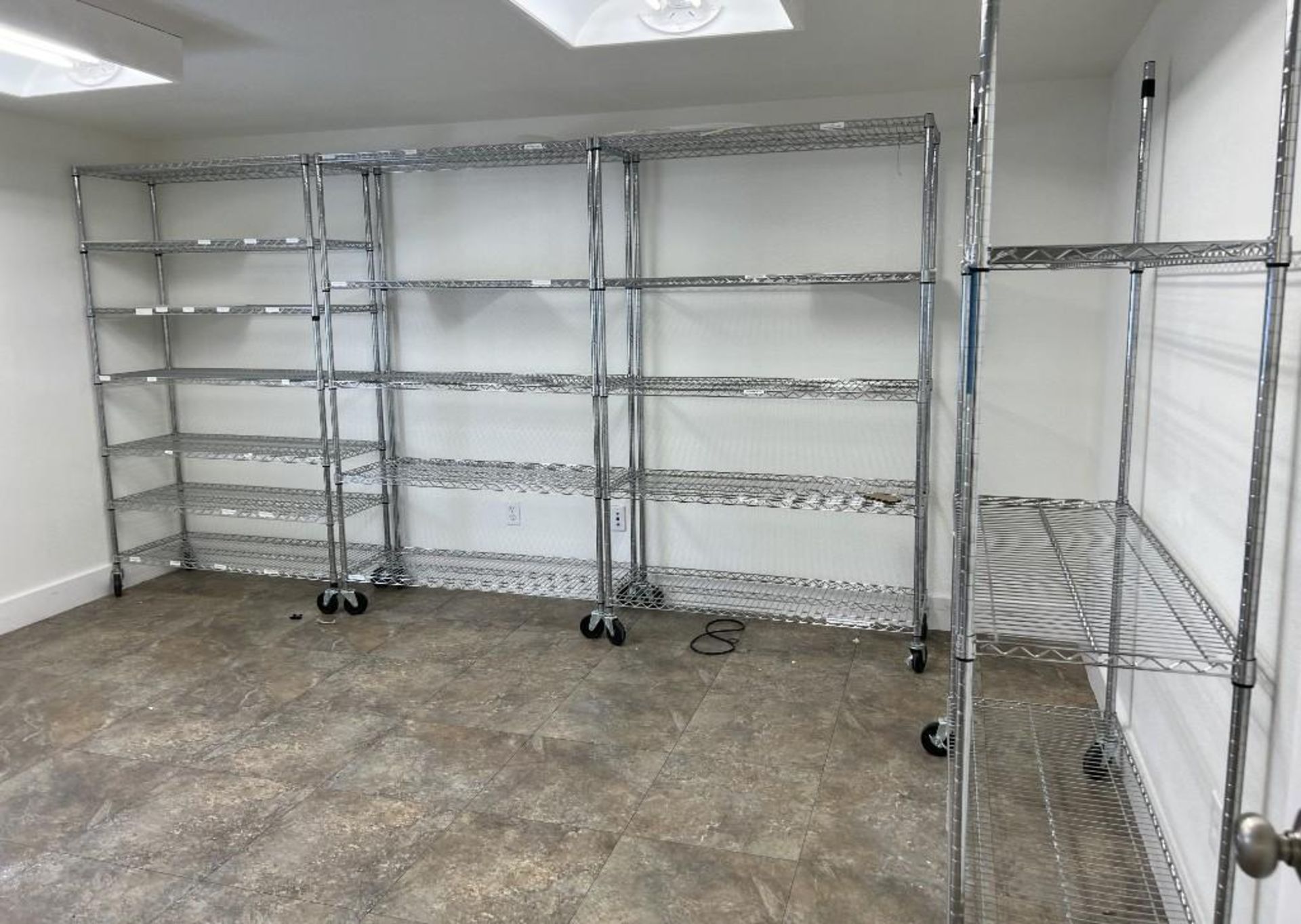 Lot Of (6) Metro Racks. With (5) extra shelves.