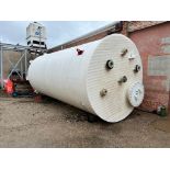 Houston Poly Tank. Measures (approximately) 150" T X 114" (diam.). Has 36" top manhole and (6) 5" to