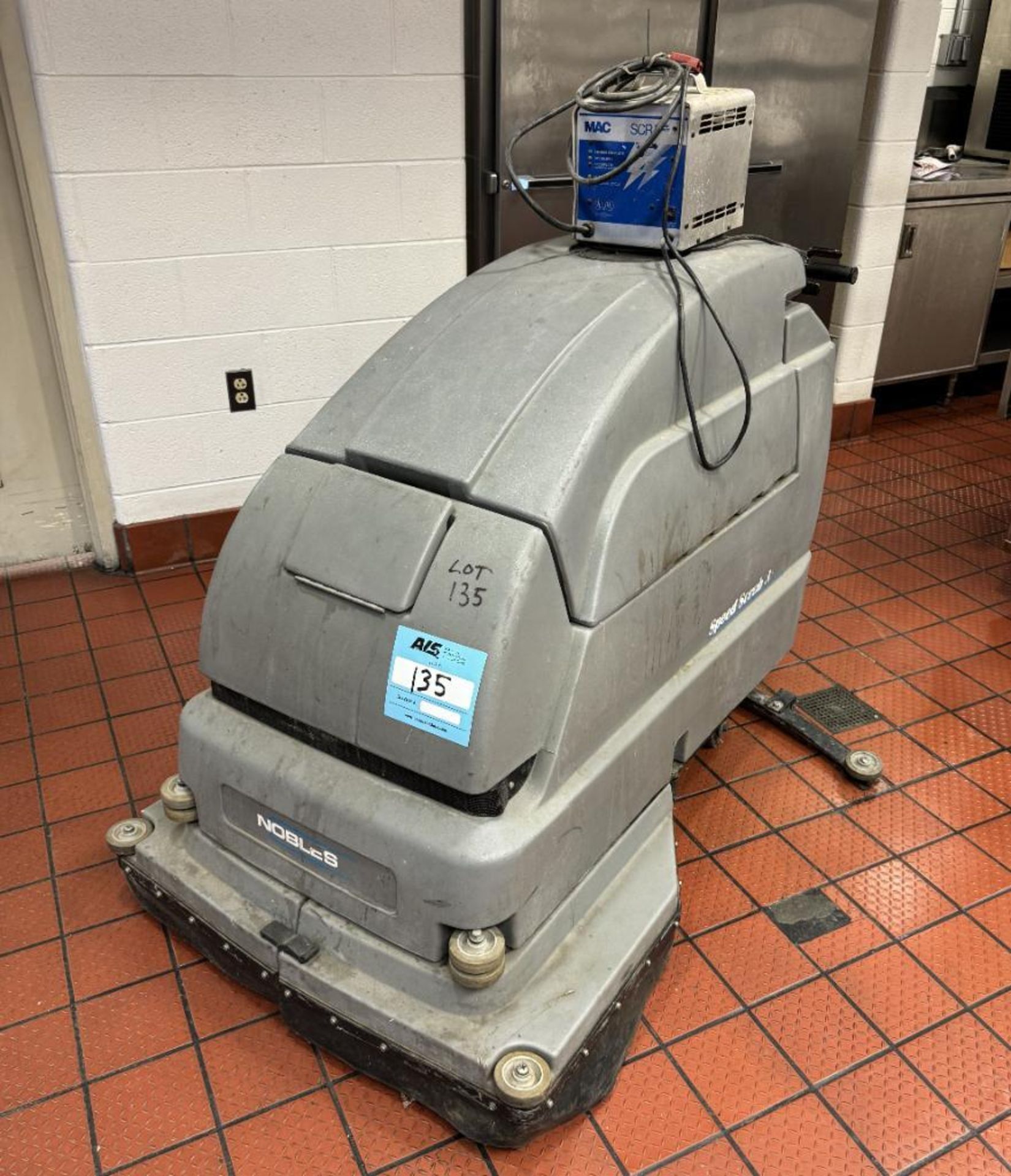 Nobles Speed Scrub 3301 Electric Floor Scrubber. With charger.**REPORTED TO NOT HOLD A CHARGE**