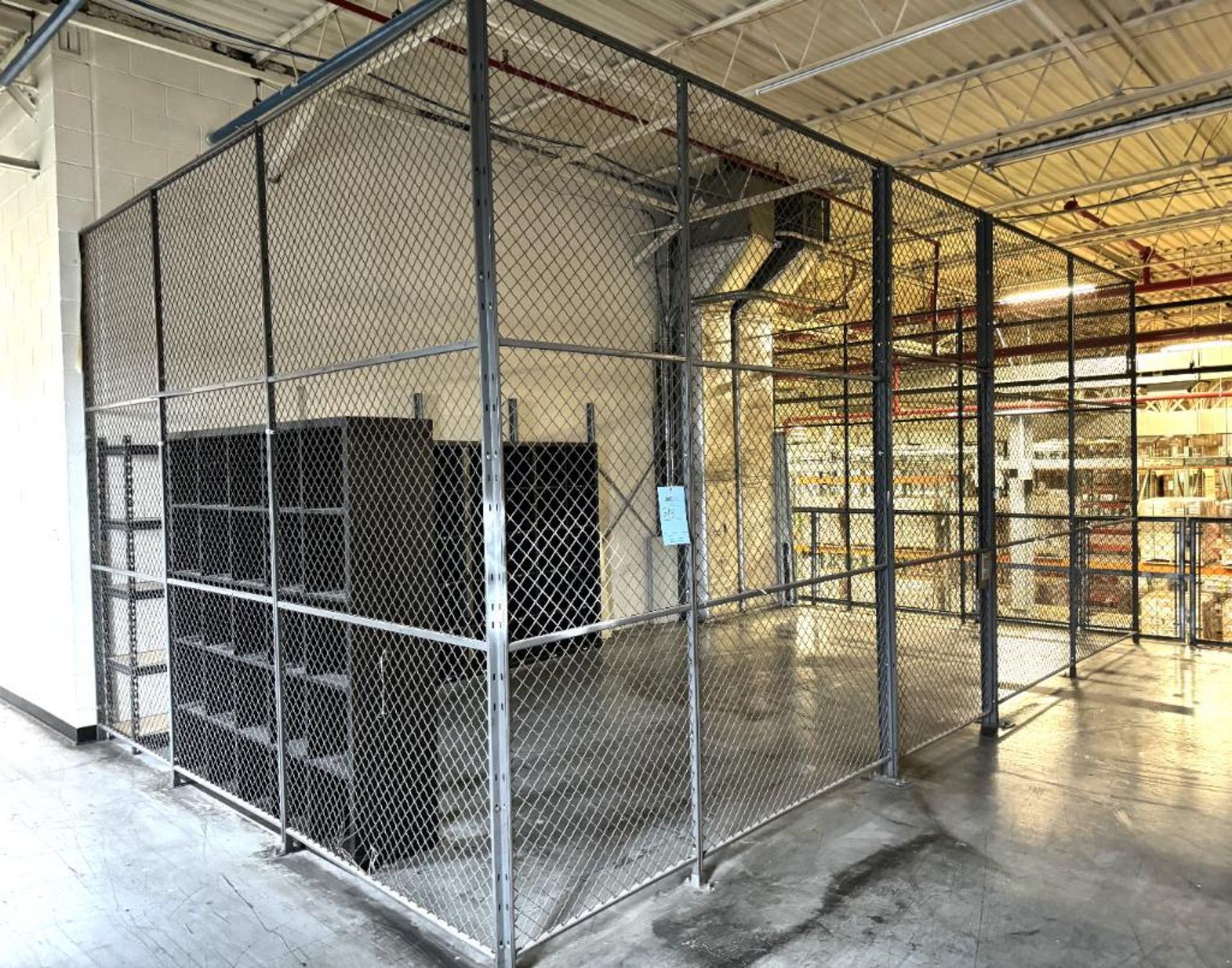 (3) Sided Security Cage, Approximate 12' x 24'.