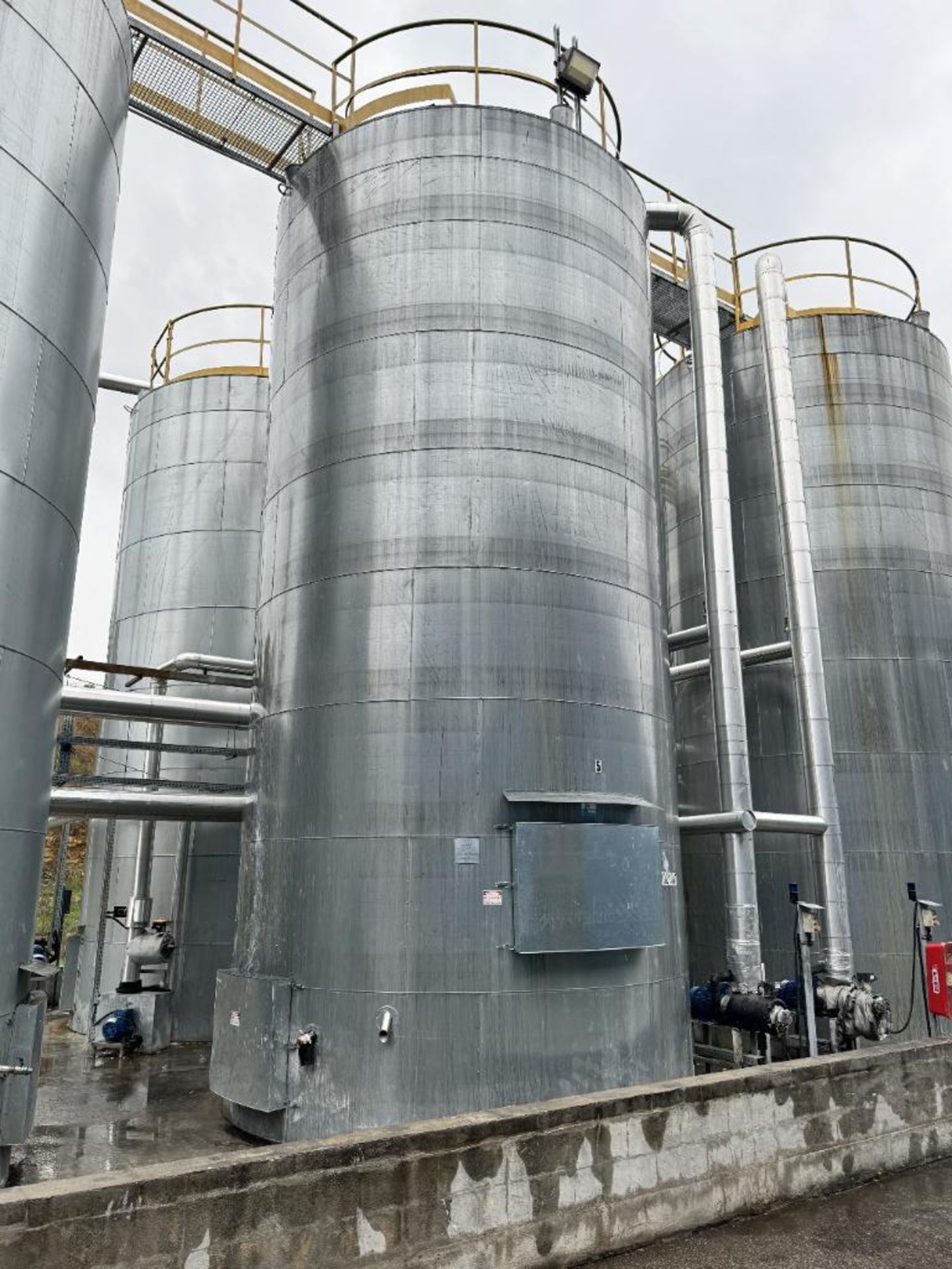 EKO Stal Approximate 60,000 Liter 304 Stainless Steel Tank. Approximate overall 146 x 26' tall. Part