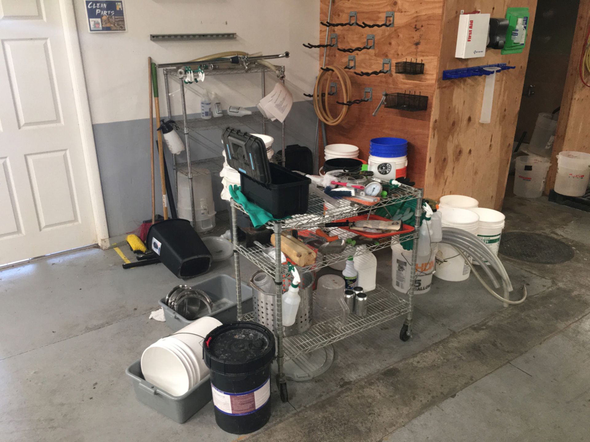 A Group of Tools, Buckets, And Storage