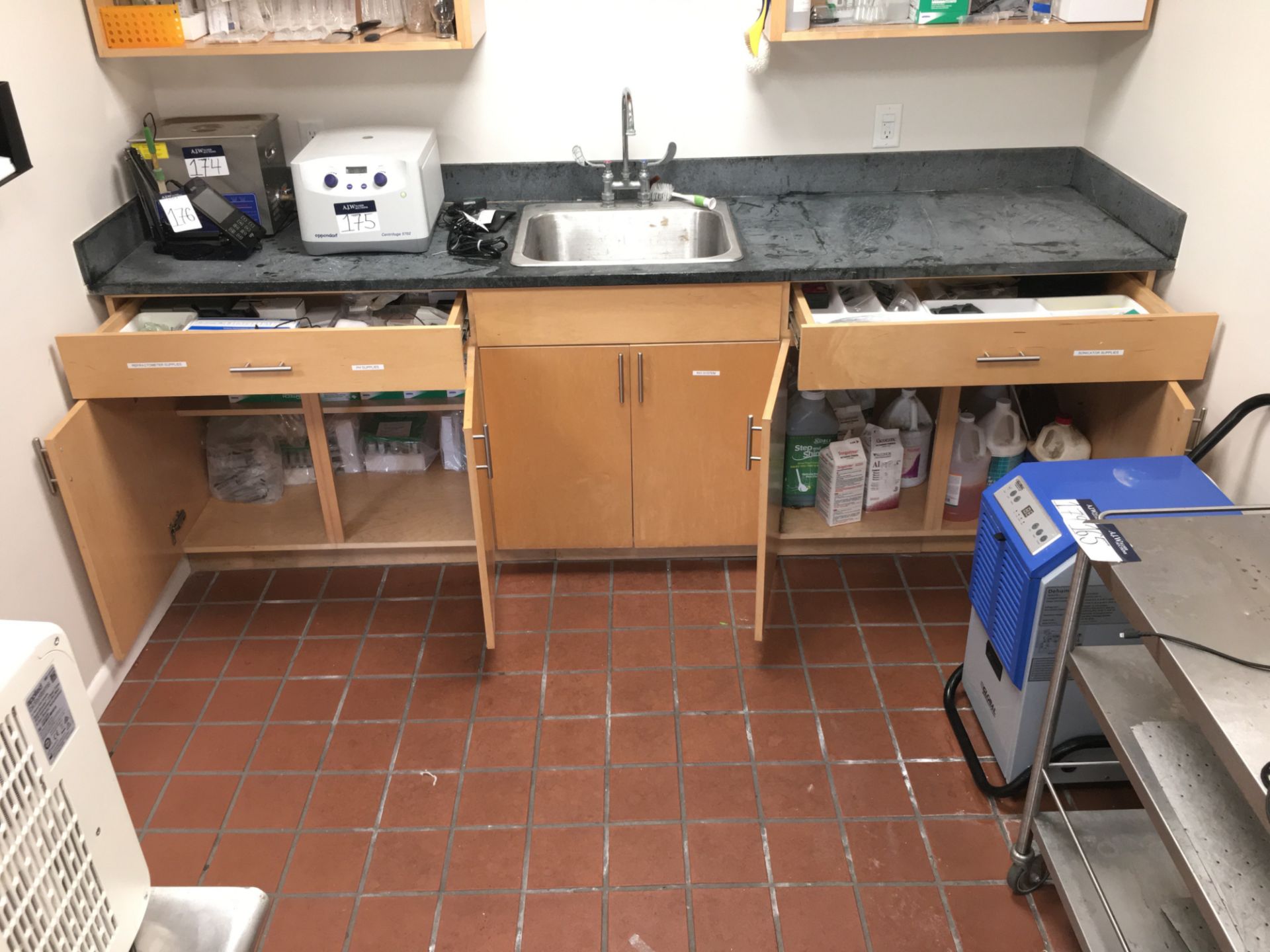 A group of Ass't Lab Supplies in LOWER Cabinets