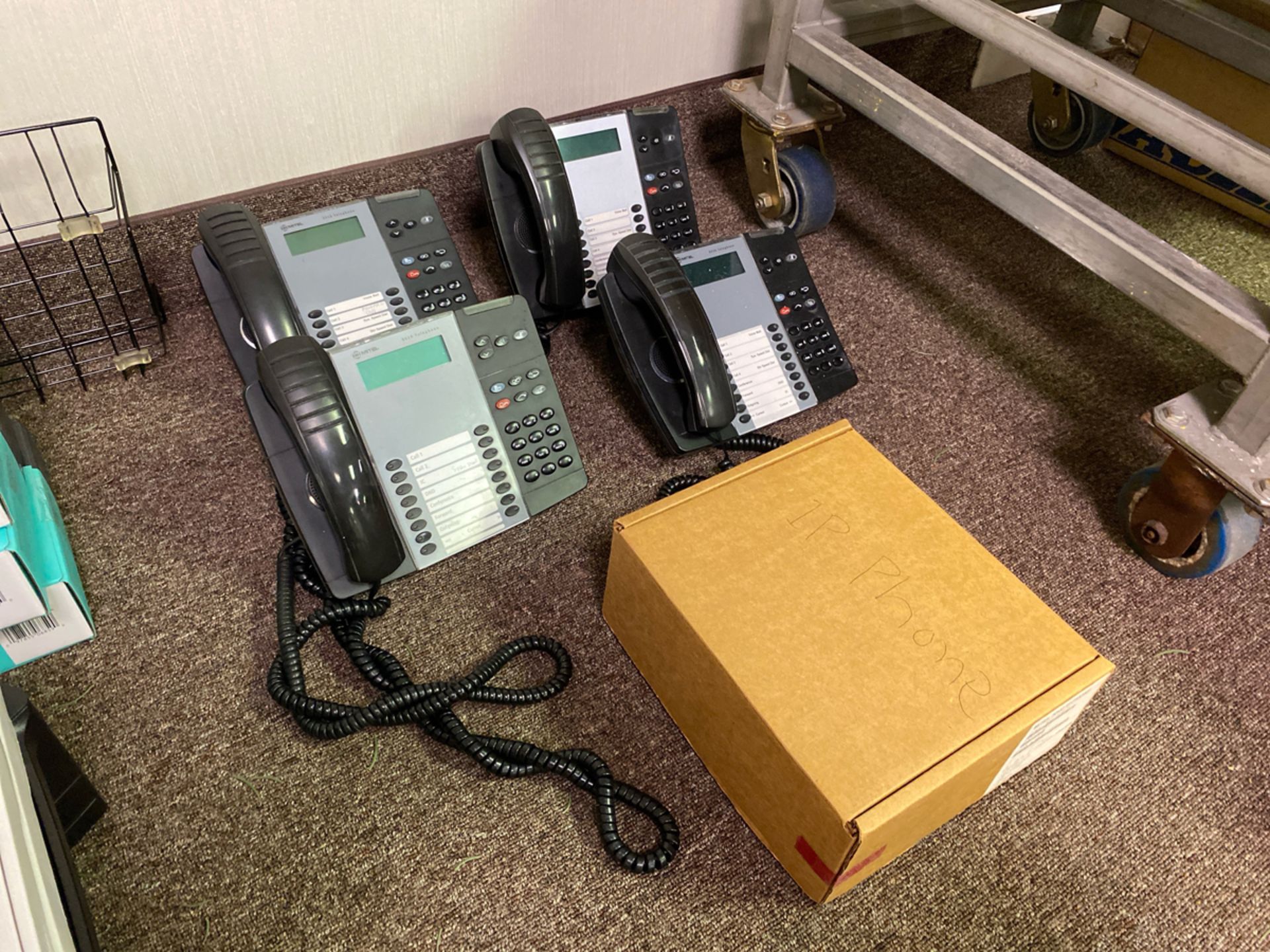 A Group of Mitel Telephones