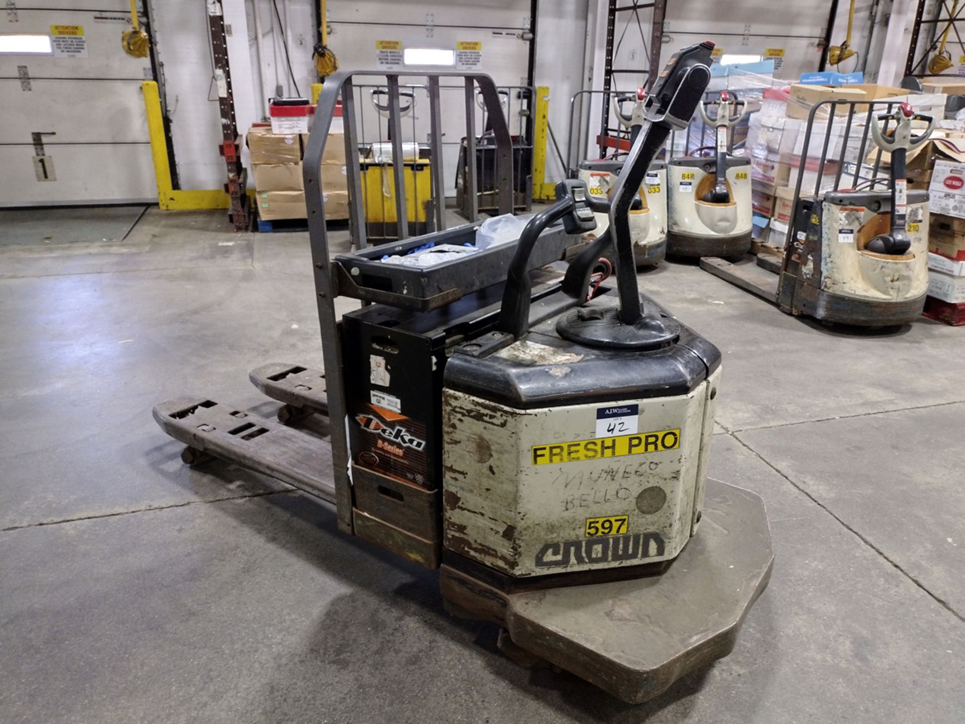 Crown PE3520-60 6,000lbs Electric 24V Rider Pallet Jack w/ Charger - Image 2 of 8