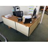 A Group of Office Furniture Throughout Rooms