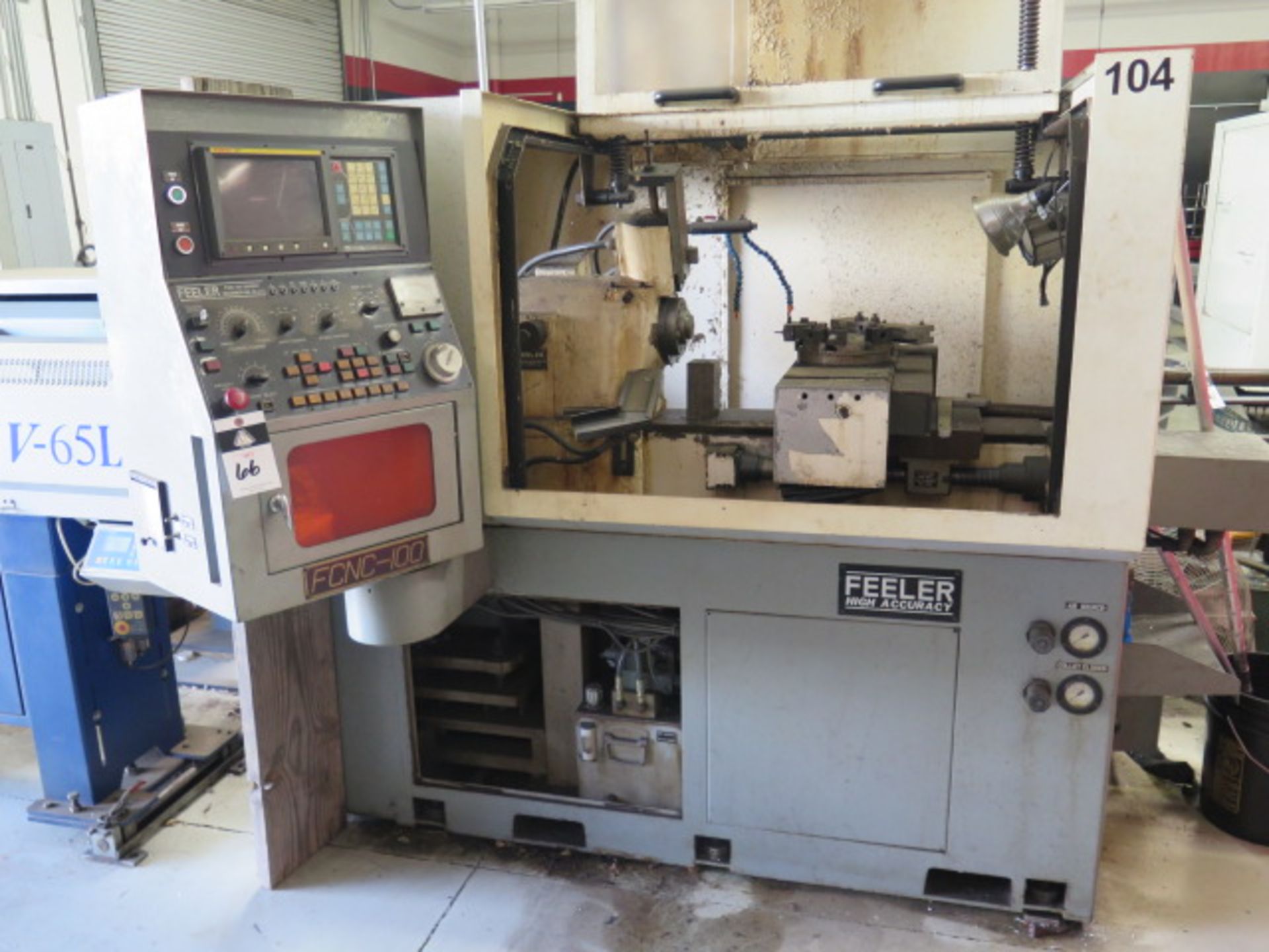 Feeler FCNC-100 CNC Chucker (FOR PARTS)w/ Fanuc 0T Controls,8-Station Turret, 16C Spindle,SOLD AS IS