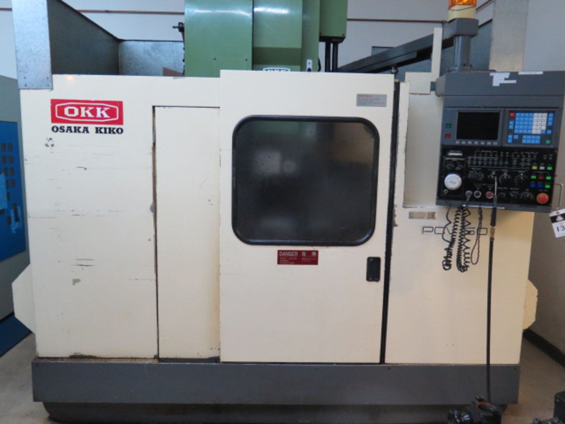 OKK PCV60 CNC VMC s/n 218 w/Fanuc Controls, Hand Wheel, 30-Station Side, SOLD AS IS