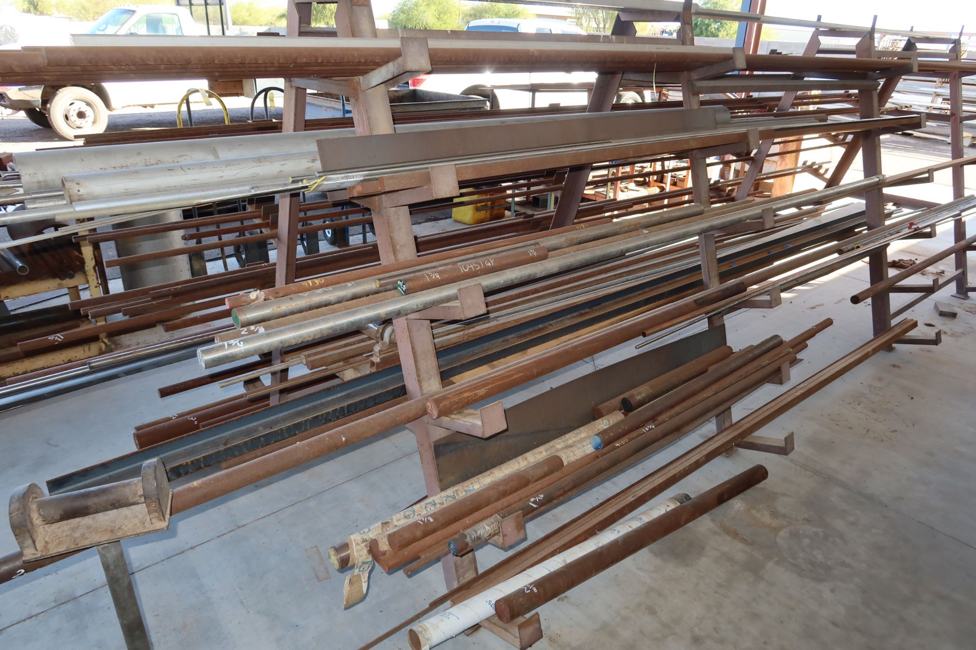LOT MATERIAL RACK W/CONTENTS, ROUND STOCK, ETC.