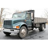 2000 Navistar International Model 4700, 4X2 188" Wheelbase Single Axle Dual Wheeled Flat Bed Stake