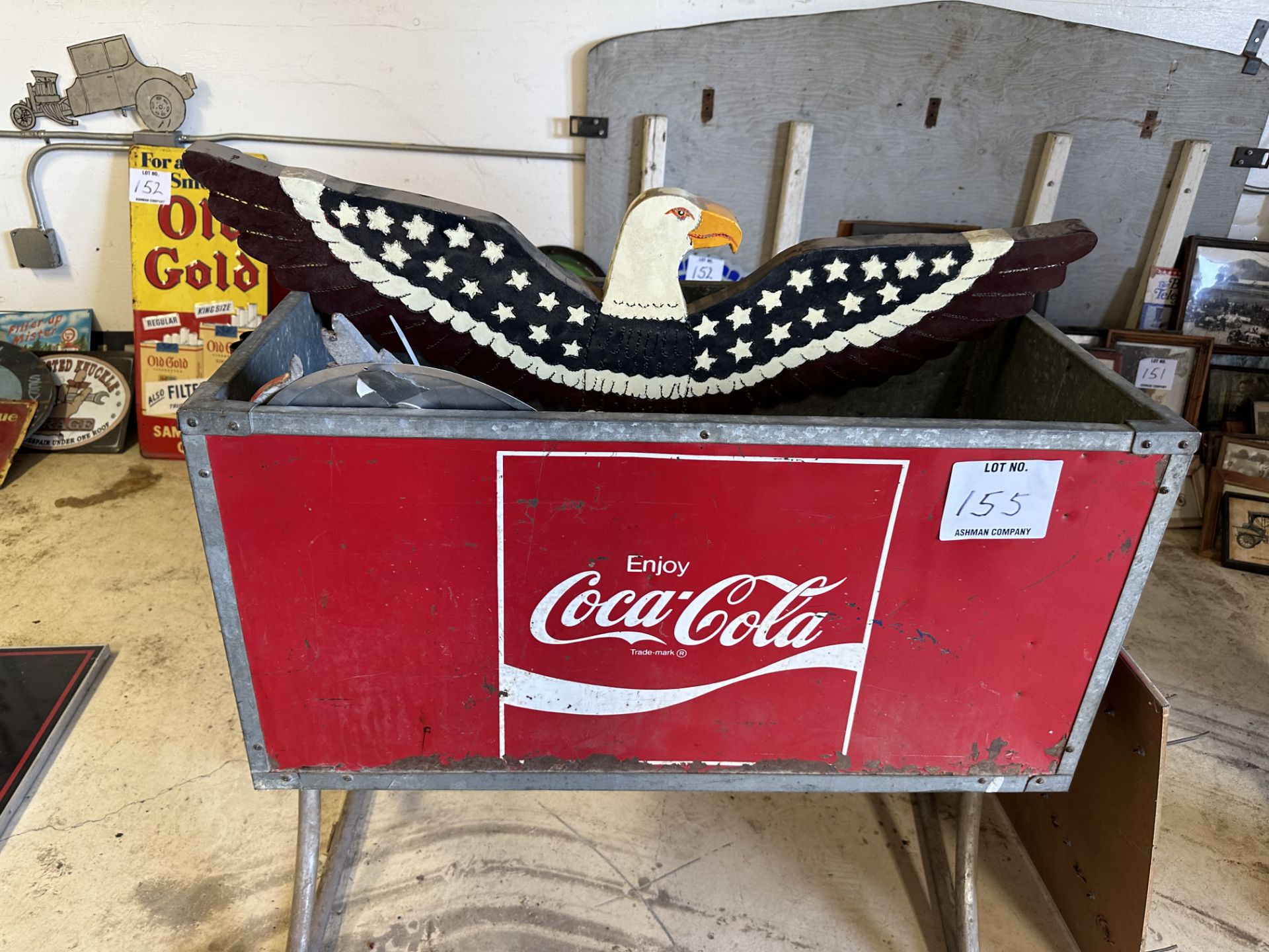 Coca-Cola iced tub with miscellaneous sign cloth, signs and clocks