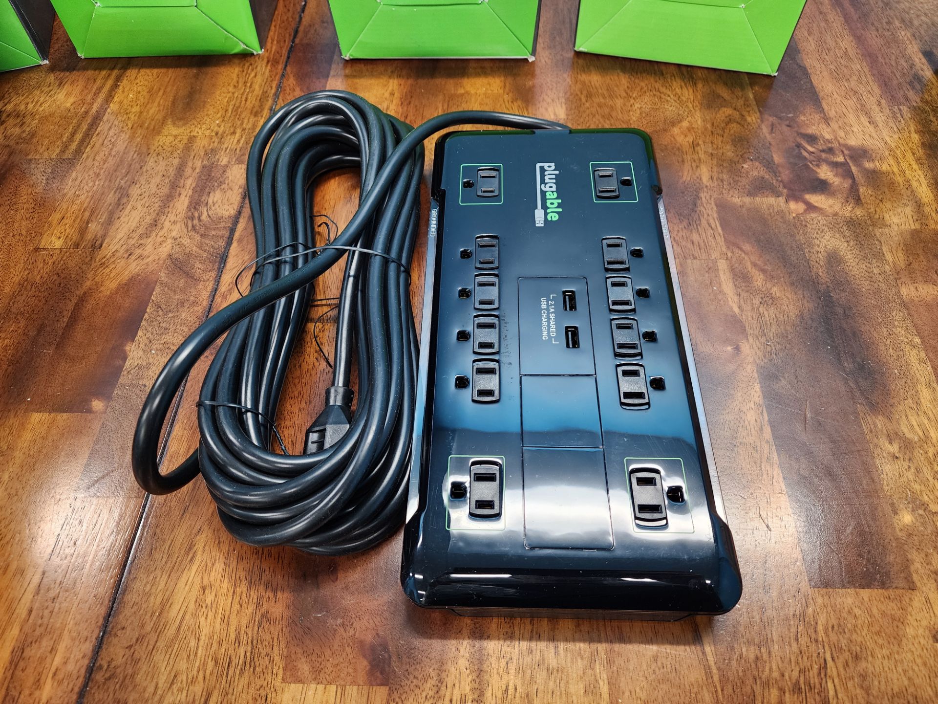 Lot of (6) Plugable 12-Outlet Power Surge Protectors w/Dual USB Charger Ports & 25' Cord - Image 4 of 4