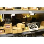 Shelf of miscellaneous circuit breakers, everything pictured